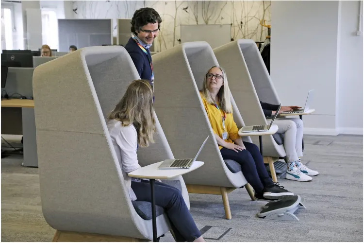 HR Colleagues chatting in office