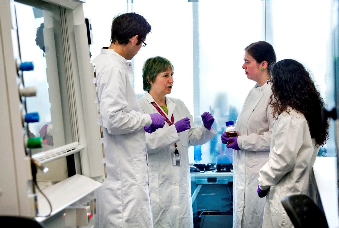 Students in a laboratory environment.